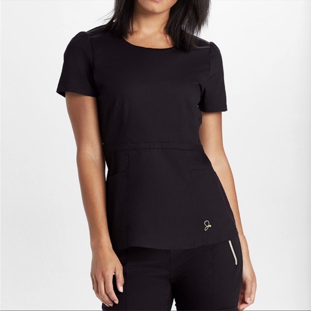 Jaanuu Peplum Scrub Top